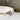 White gold engagement ring with light lavender rectangular center, fantasy design