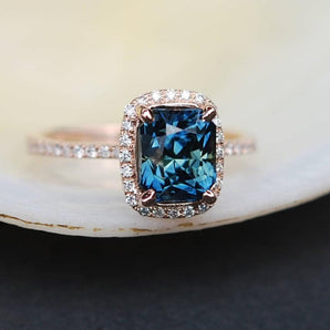 Emerald Cut Teal Sapphire Halo Ring