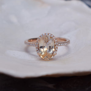 Oval Apricot Sapphire Halo Ring