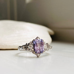 White gold engagement ring with light lavender rectangular center, fantasy design