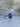 natural lavender sapphire engagement ring oval cut 14k white gold godivah setting with diamonds soft light
