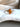 Fiery orange sapphire ring with marquise cut center and floral nature-inspired design