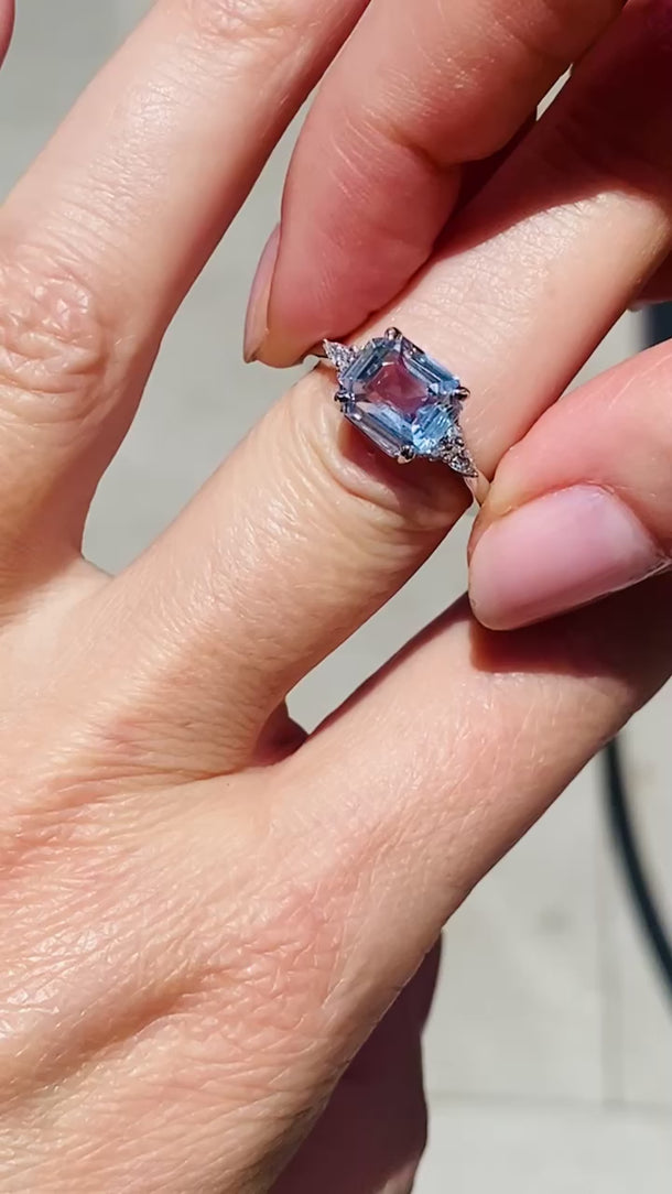 Elegant white gold engagement ring featuring a 3ct natural ice blue sapphire and diamonds