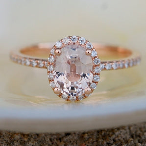 Oval Pink Sapphire Halo Ring