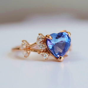 Purple Heart sapphire and diamond ring