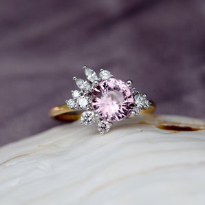 Unique round pink sapphire and diamond ring